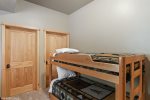 Twin oven twin bunks with an additional twin in this room